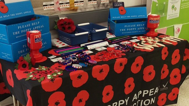 Image result for poppy appeal table