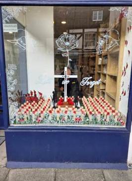 A display of a memorial in a store

AI-generated content may be incorrect.