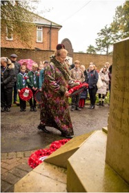 Carlie Mayes laying Branch wreath on memorial at Heybridge